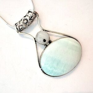 Beautiful, 2 inch, 925 marked, Moonstone pendant on a silver chain.